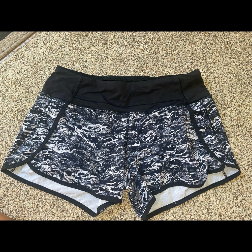 Lululemmon, speed up high rise shorts. Size 6, 4 inches long. Multi-colored.